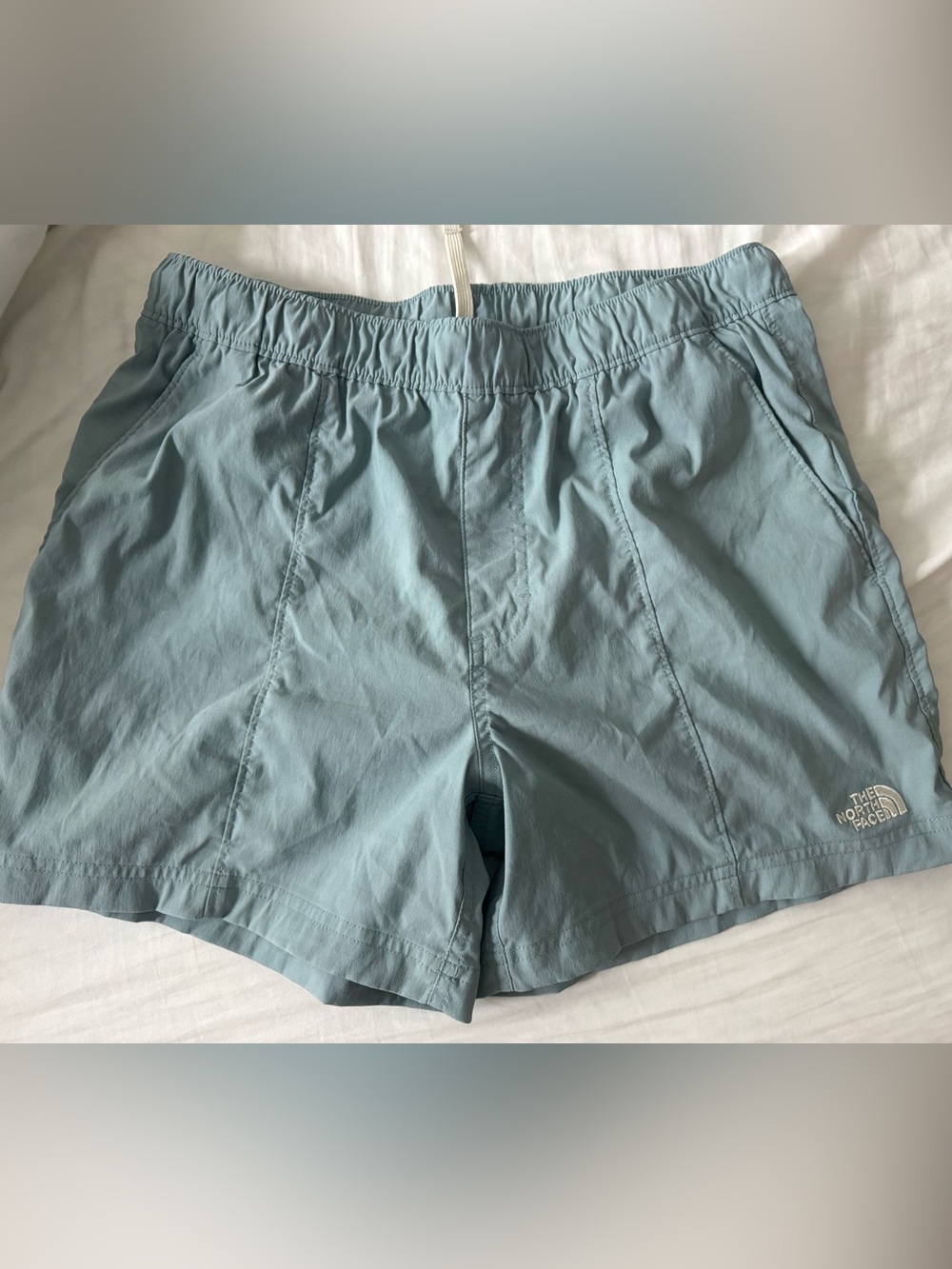 The North Face men’s blue pull on shorts size small